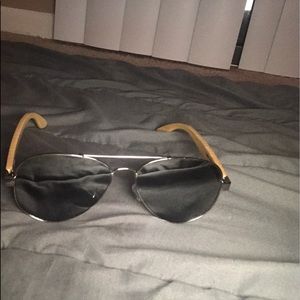 Sunglasses , wood handles.