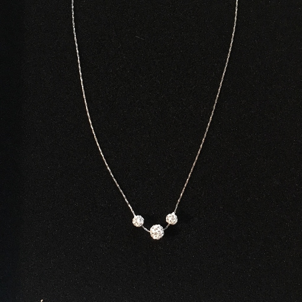 silver necklace with gemstone beads and clasp