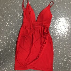 Bodycon red cocktail dress.
