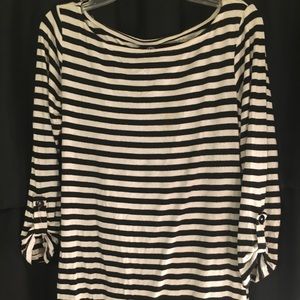 Women’s black and white stripped shirt.