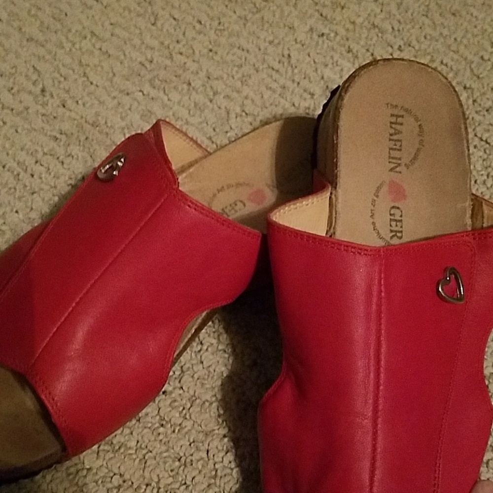 Red leather clogs
