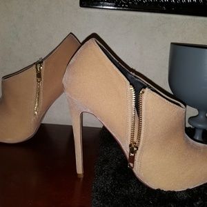 Heeled, suede side zipper booties