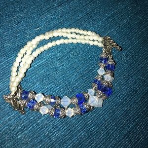 Three strand blue, pearl, silver, white bracelet