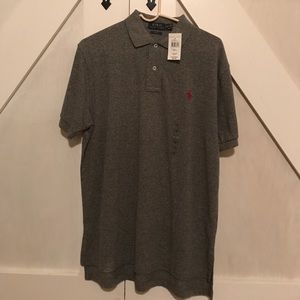 Brand new with tags Medium Polo Shirt.