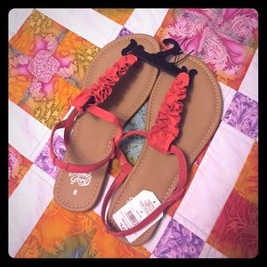 Salmon colored ruffle sandals