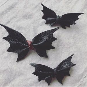 Leather bat bows