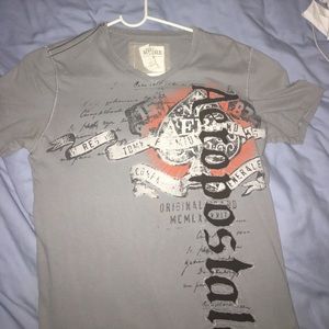 snug at the arms Aeropostale shirt. Perfect cond.