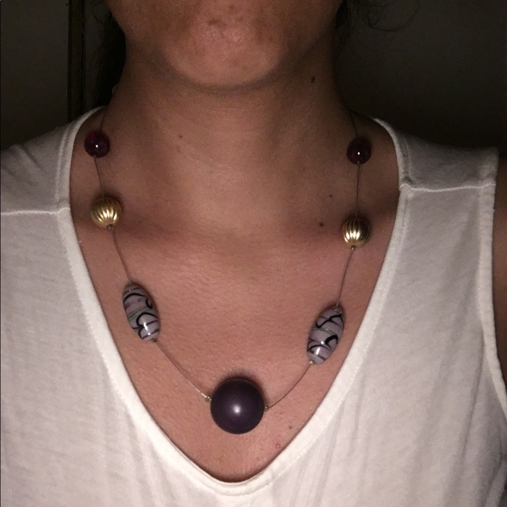 Purple and gold necklace.