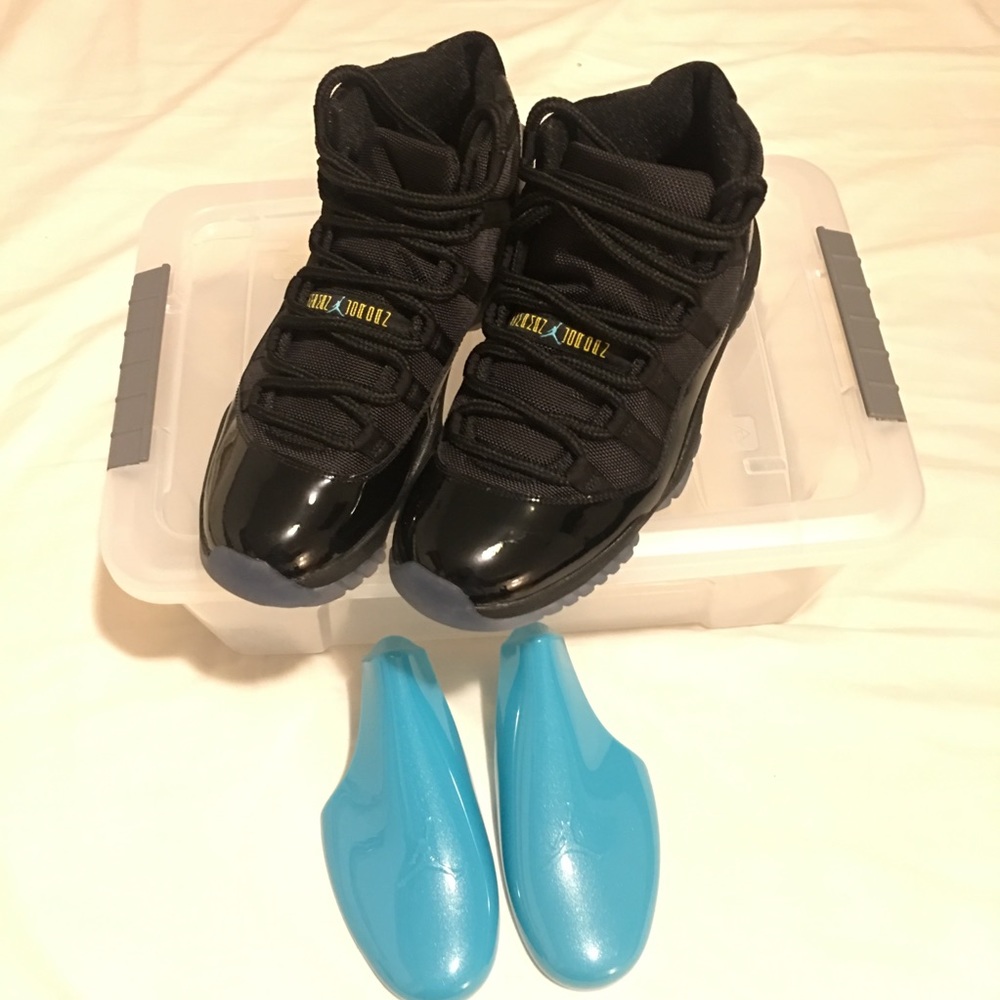 UEC Authentic Jordan 11’s Black Gamma Blue