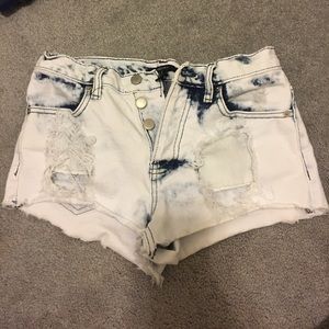 Destroyed denim shorts