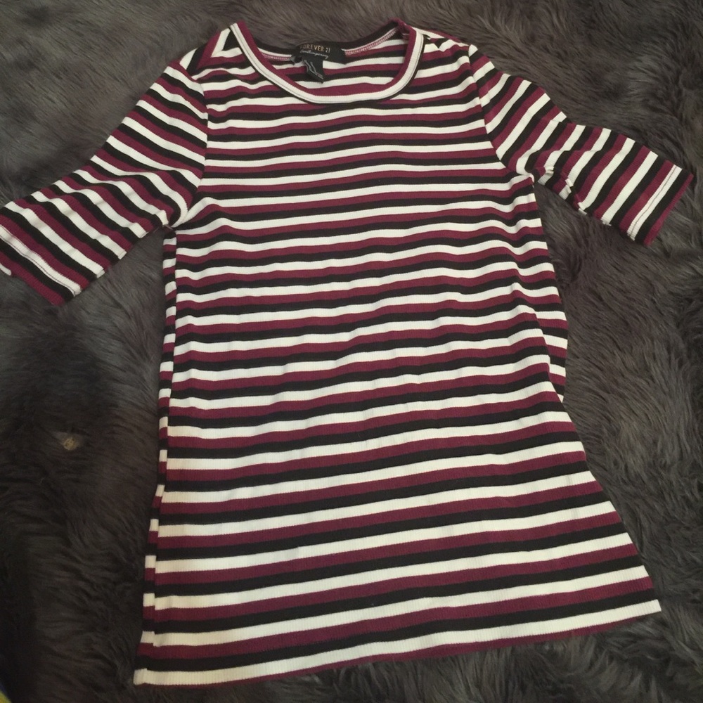 Tight form fitting slightly cropped shirt