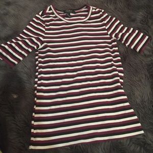 Tight form fitting slightly cropped shirt