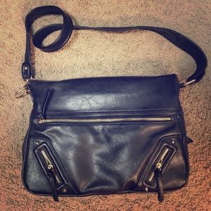 Black leather fold over hand bag/shoulder bag