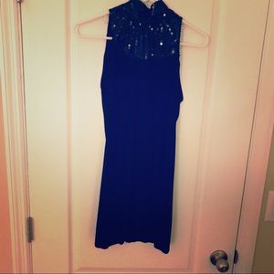 Sleeveless turtleneck tunic