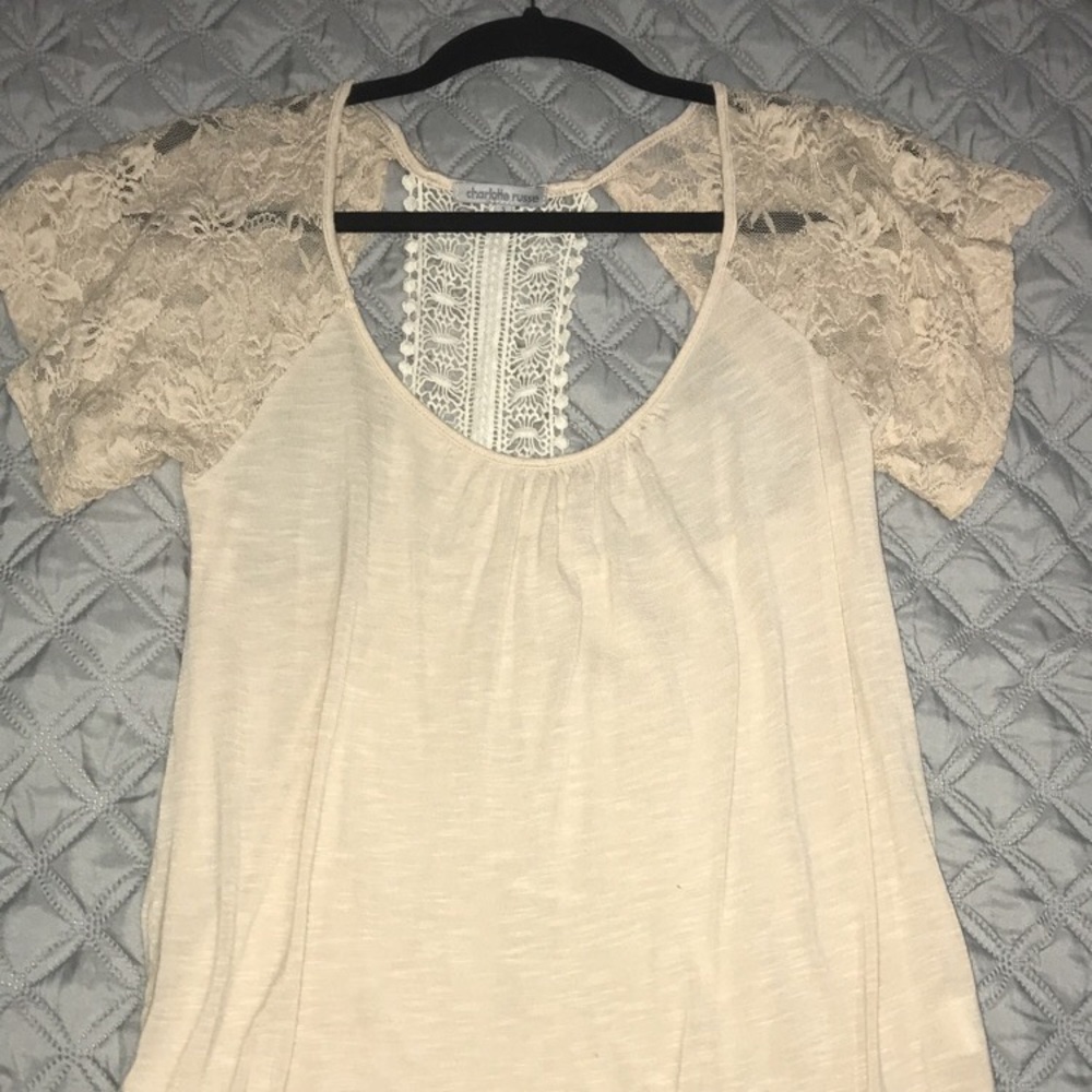 Super cute blouse with semi open back