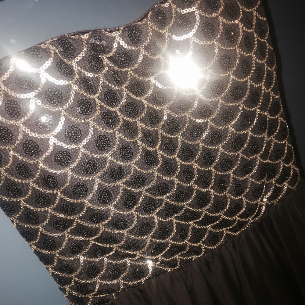 Black high low dress with gold loops