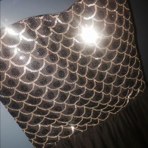 Black high low dress with gold loops