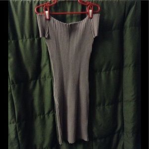 A tight fitted lavender dress
