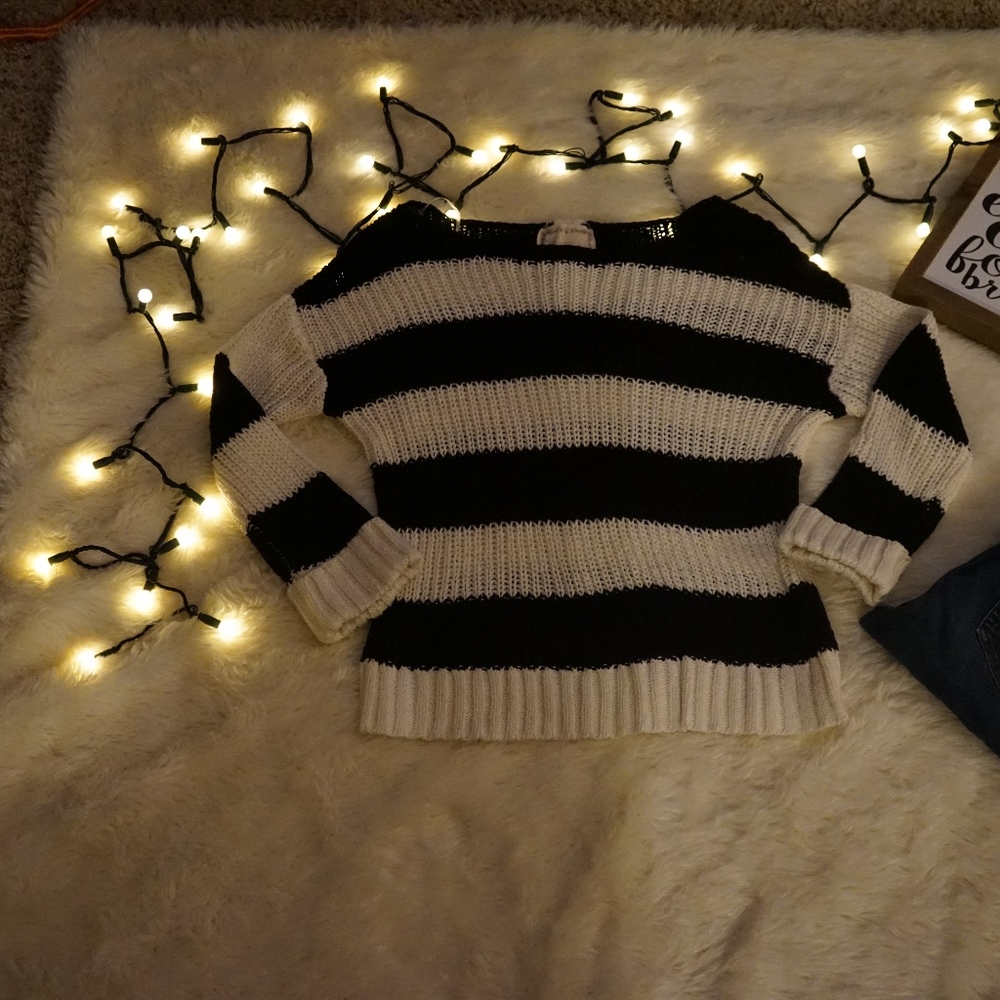 Black and white stripped sweater. Size medium