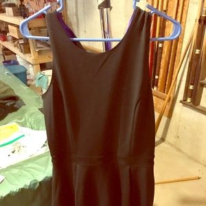 Skater style black dress with open back