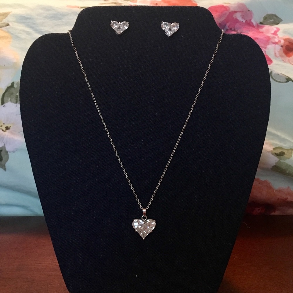 Silver necklace and stud earrings