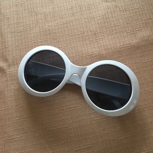 White oval/round sunglasses