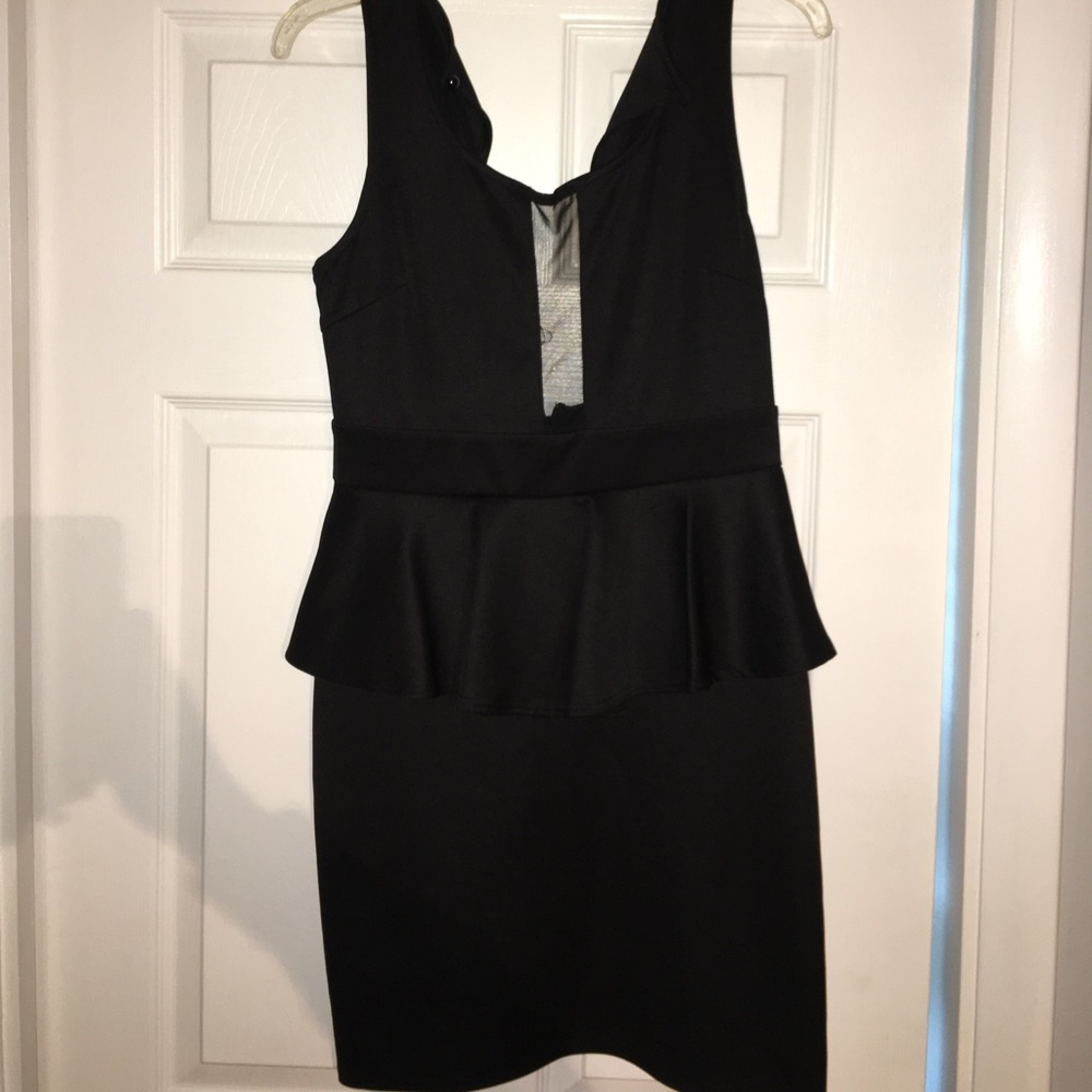 Peplum dress with mesh plunged neckline