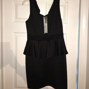Peplum dress with mesh plunged neckline