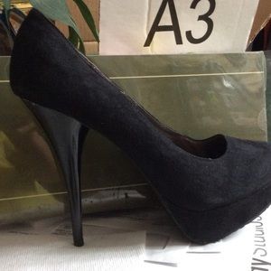 Black suede pumps