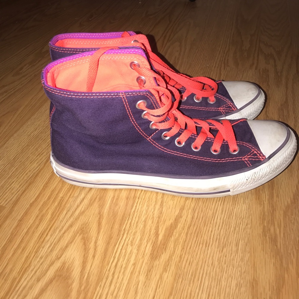 Neon orange and purple High top Converse.