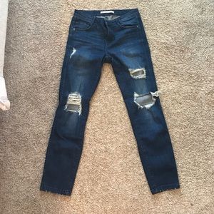 Zara ripped jeans.