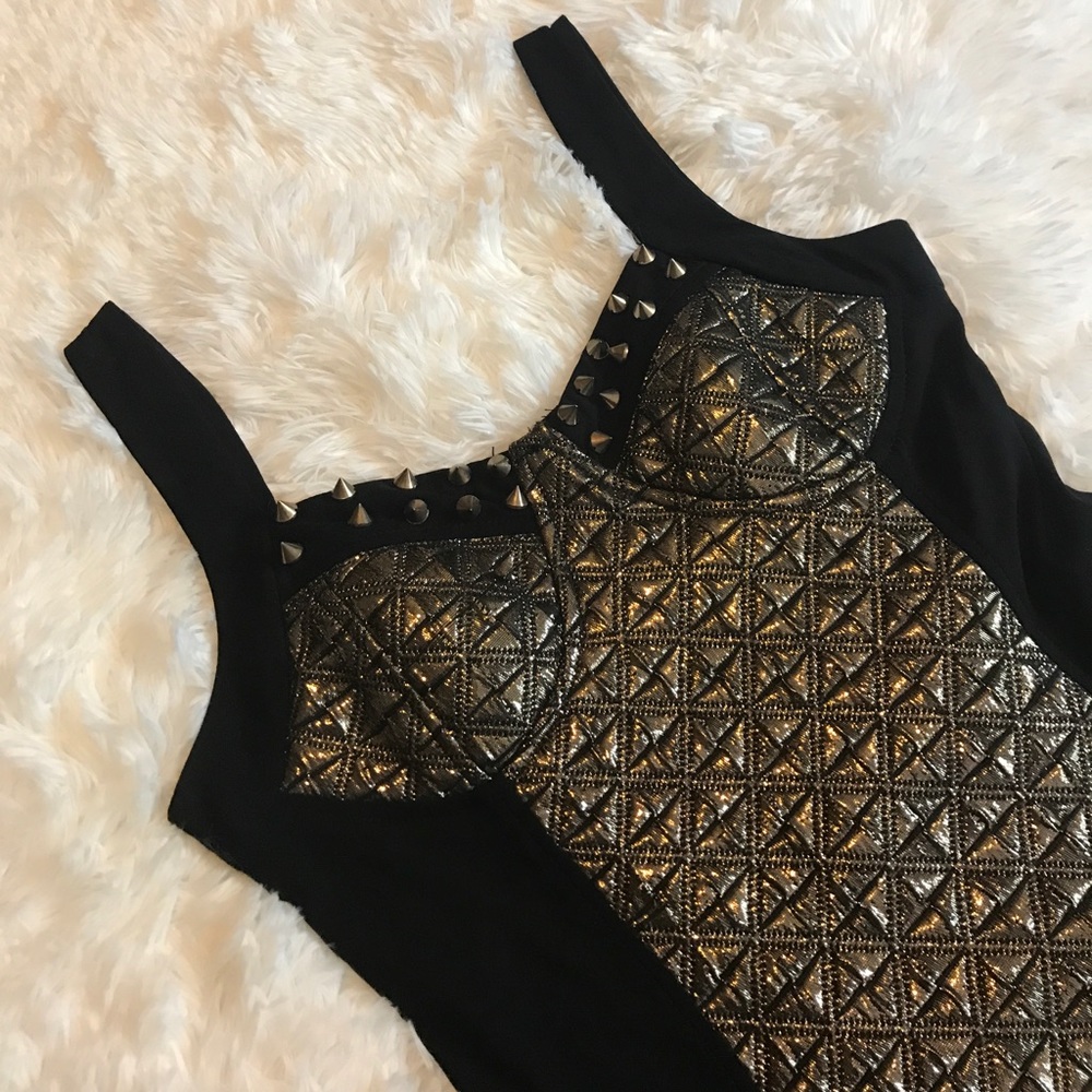 Black and gold studded black dress