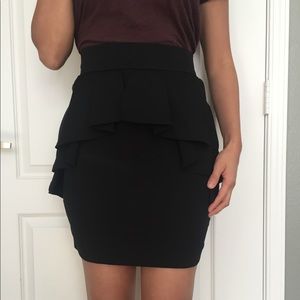 bebe black peplum skirt. Size 4