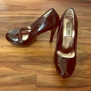 Black Steve Madden patent leather pumps