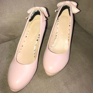 Light pink high heels with bows on The back!