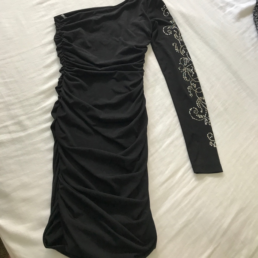 One sleeved black cocktail dress