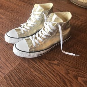 Gold high top converse