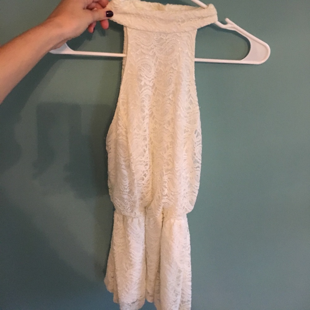White lace shirt, high neck, open back