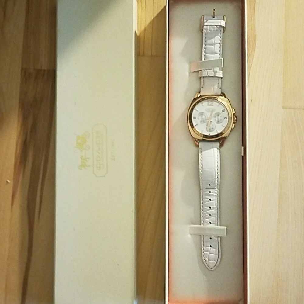 white and gold Coach Watch