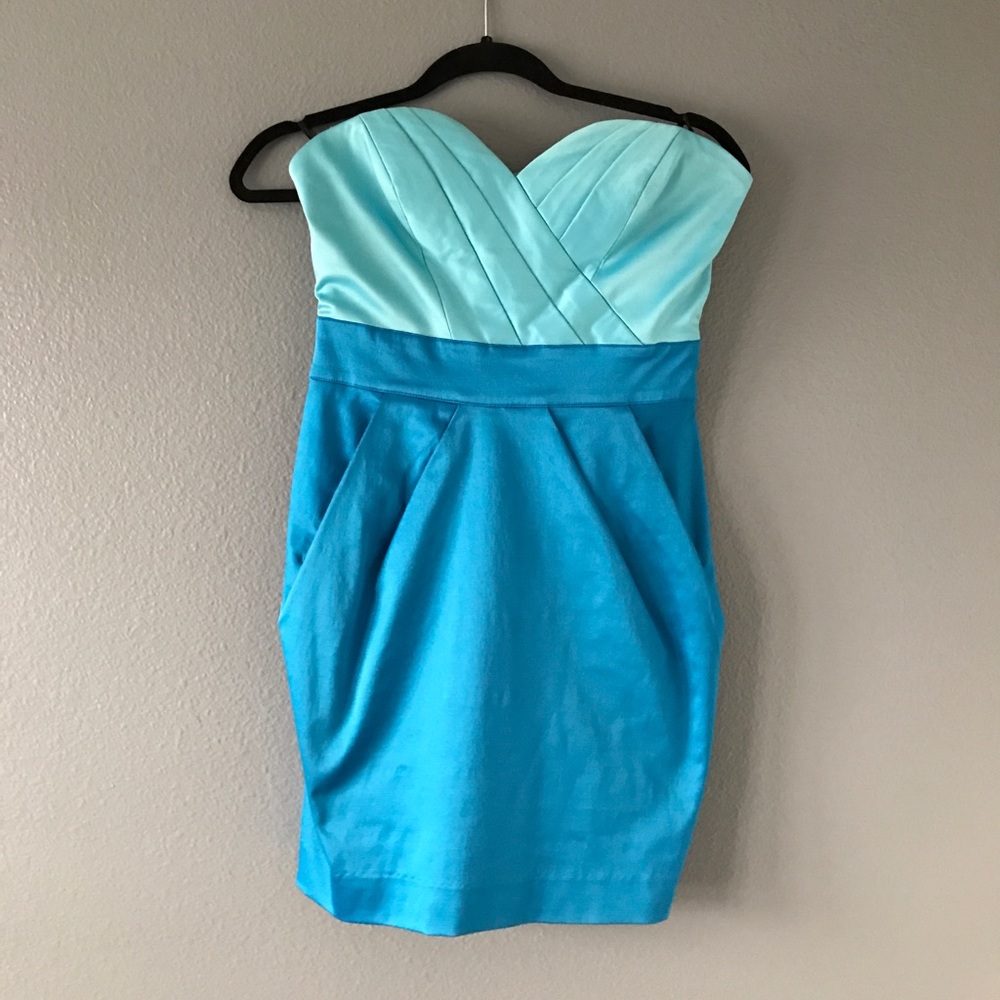 Short blue Bebe strapless dress