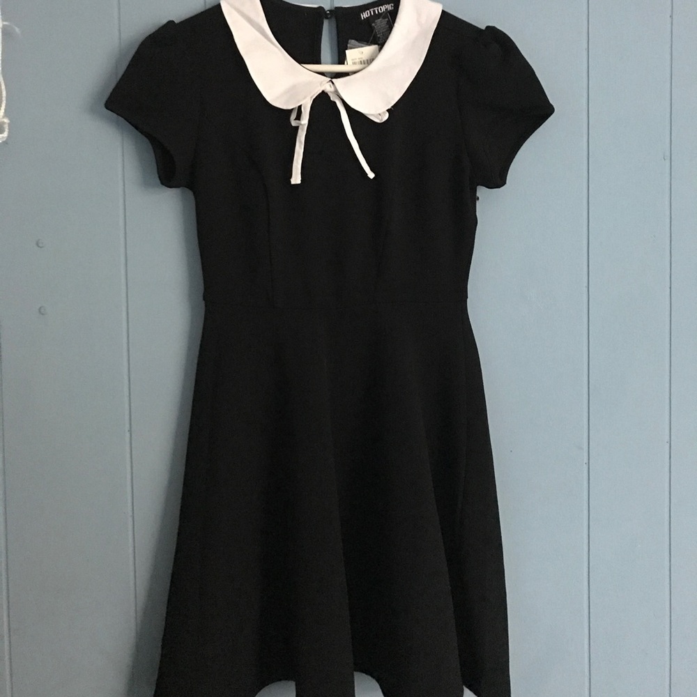 Black dress, white collar
