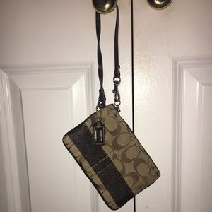 Gold/tan Coach wristlet