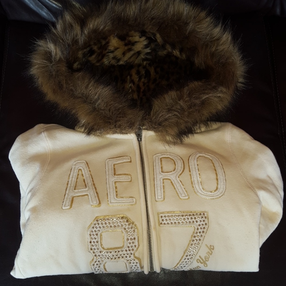 Jacket with furry cheetah hood