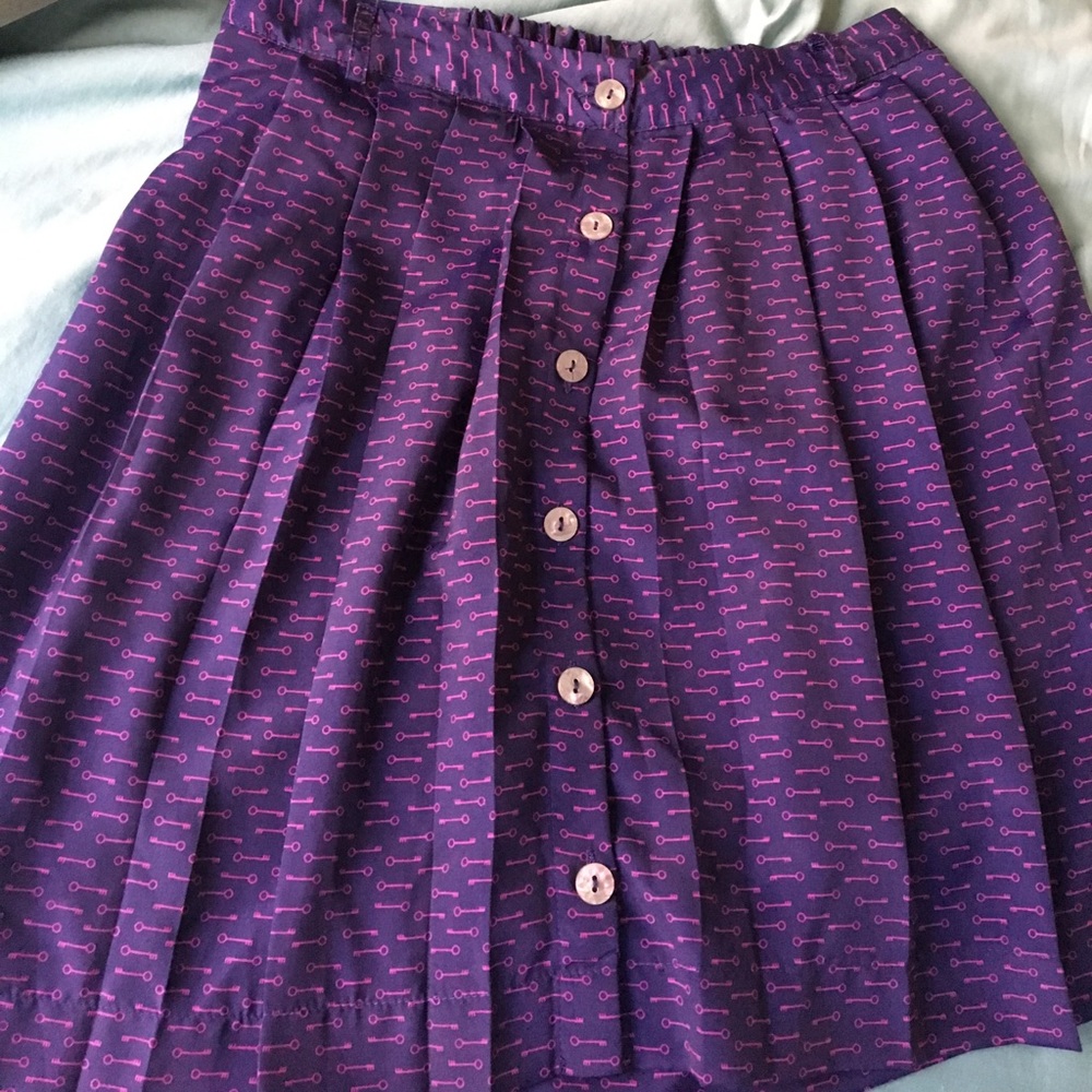 Pleated button front skirt