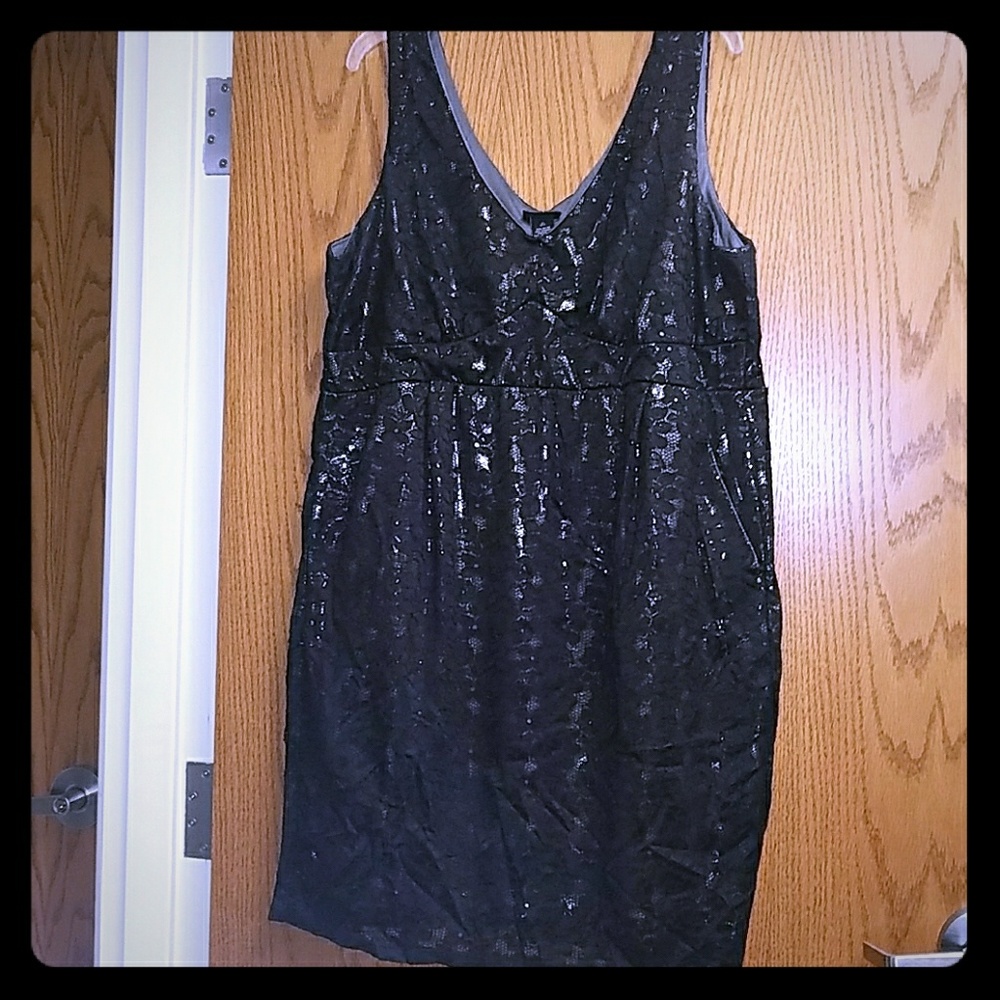 Adorable Black lace dress w/Silver Metallic lining