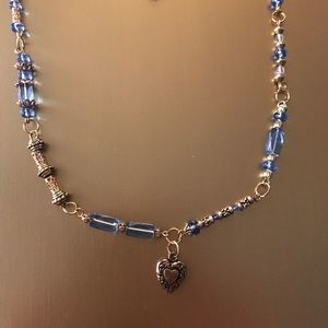 Blue and gold beaded necklace with heart charm