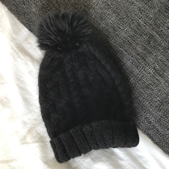 Eugenia Kim Black Pom Pom beanie hat.