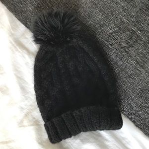 Eugenia Kim Black Pom Pom beanie hat.