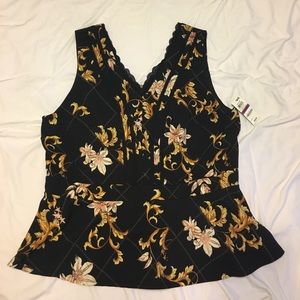 Black sleeveless peplum top