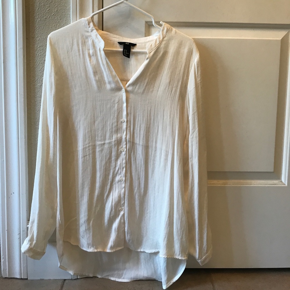 H&M cream blouse.